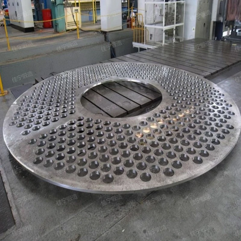 Free forging of round cake